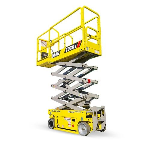 GMG 1930i electric scissor lift with platform extended outdoors on jobsite
