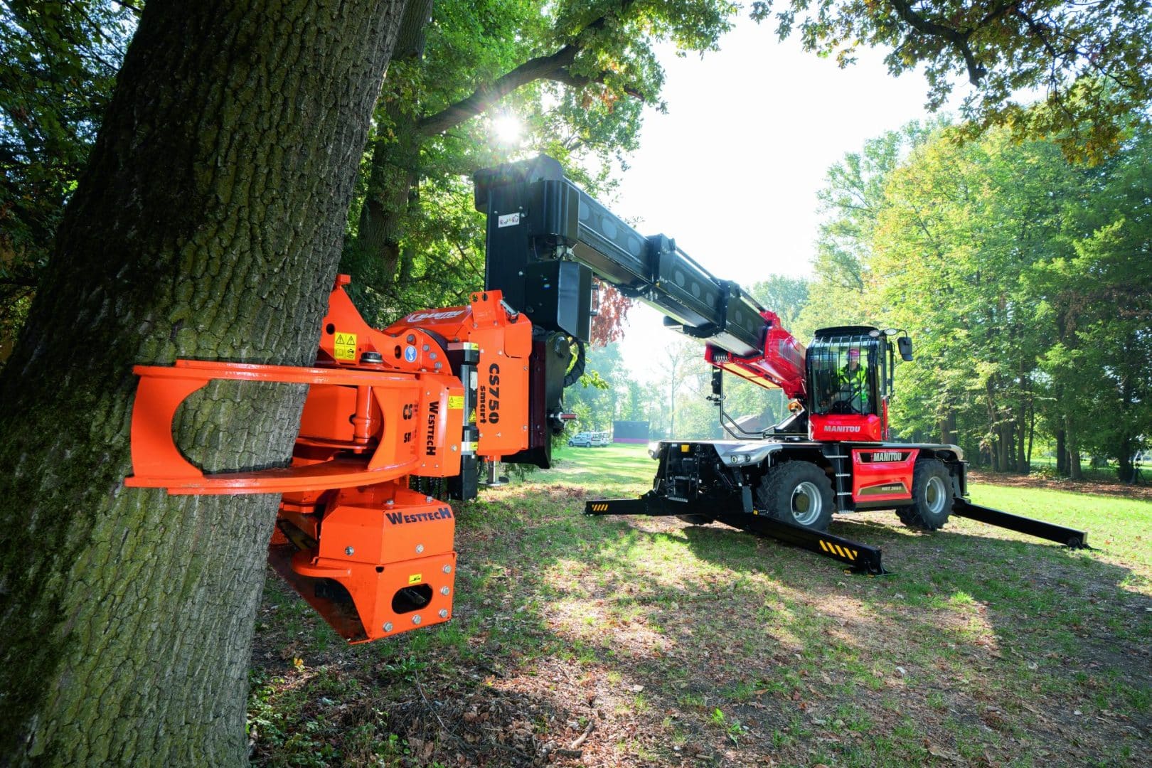 Maximize Efficiency with the Manitou MRT3060 and Woodcracker CS750 for Safe and Efficient Tree Removal